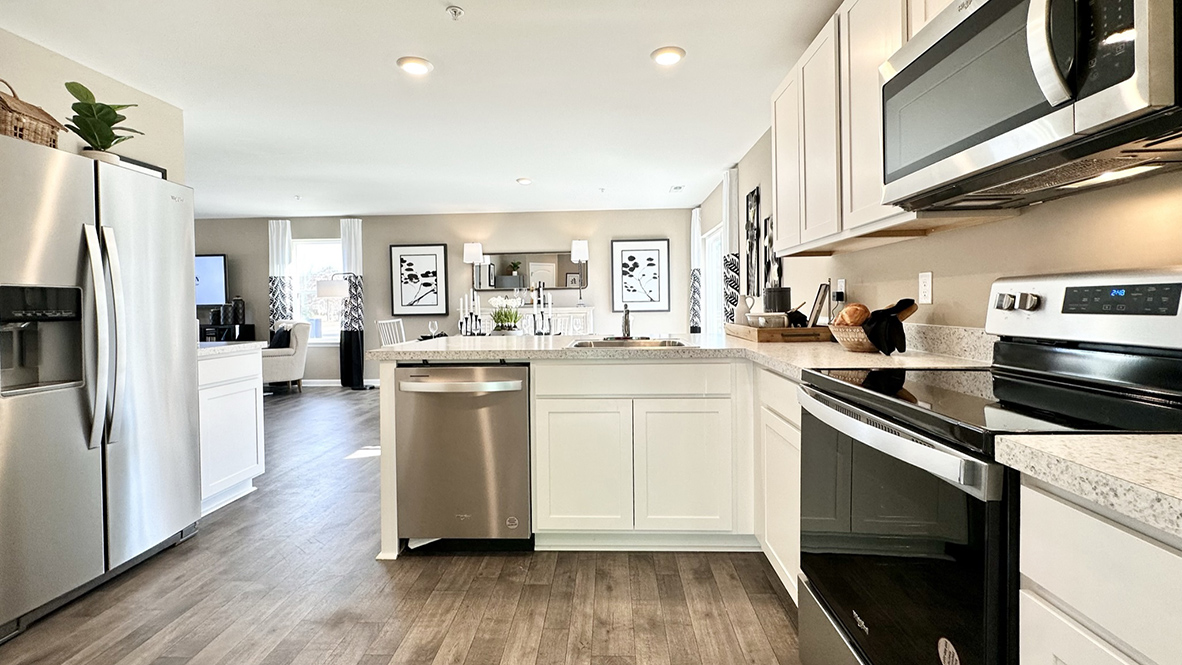 The family-friendly kitchen has stainless steel appliances.