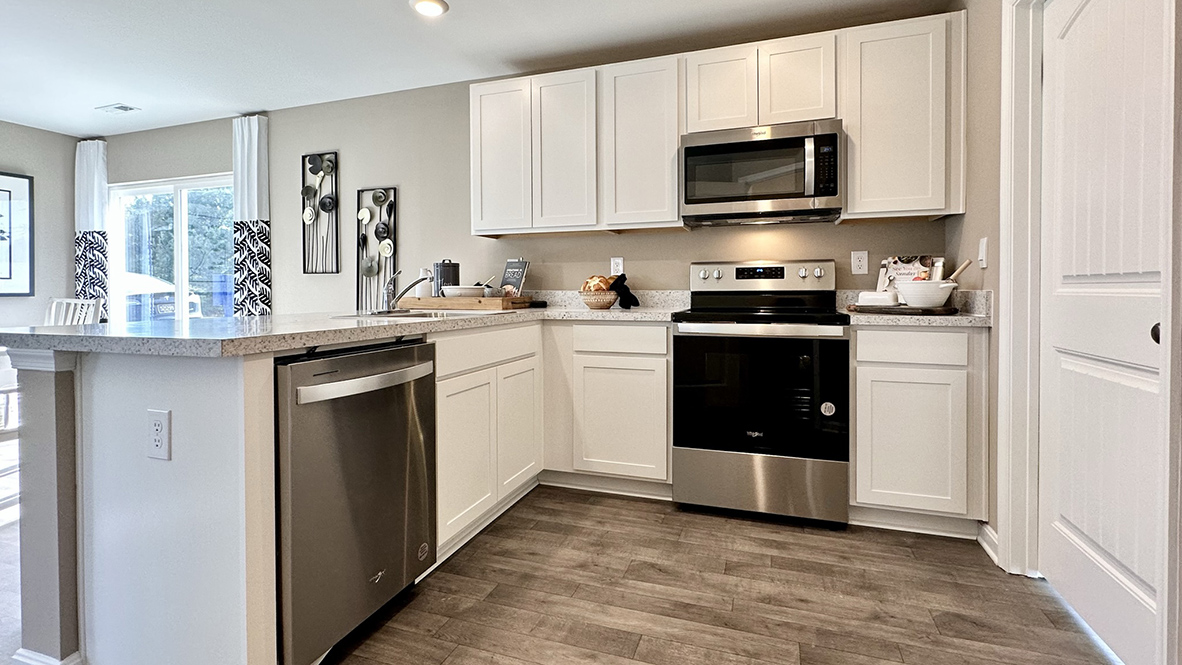 The family-friendly kitchen has stainless steel appliances.