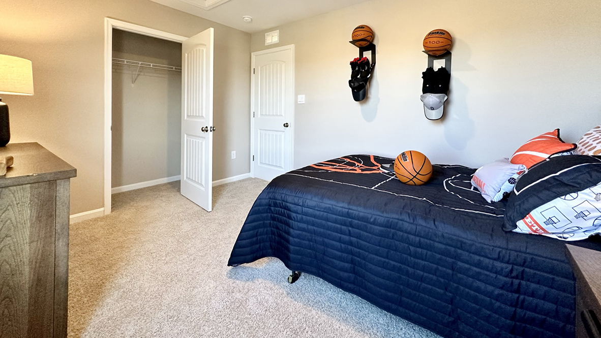 There are three additional bedrooms and a secondary bathroom on the second floor.