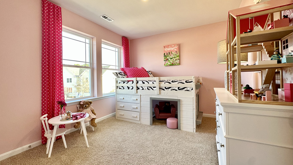 There are three additional bedrooms and a secondary bathroom on the second floor.