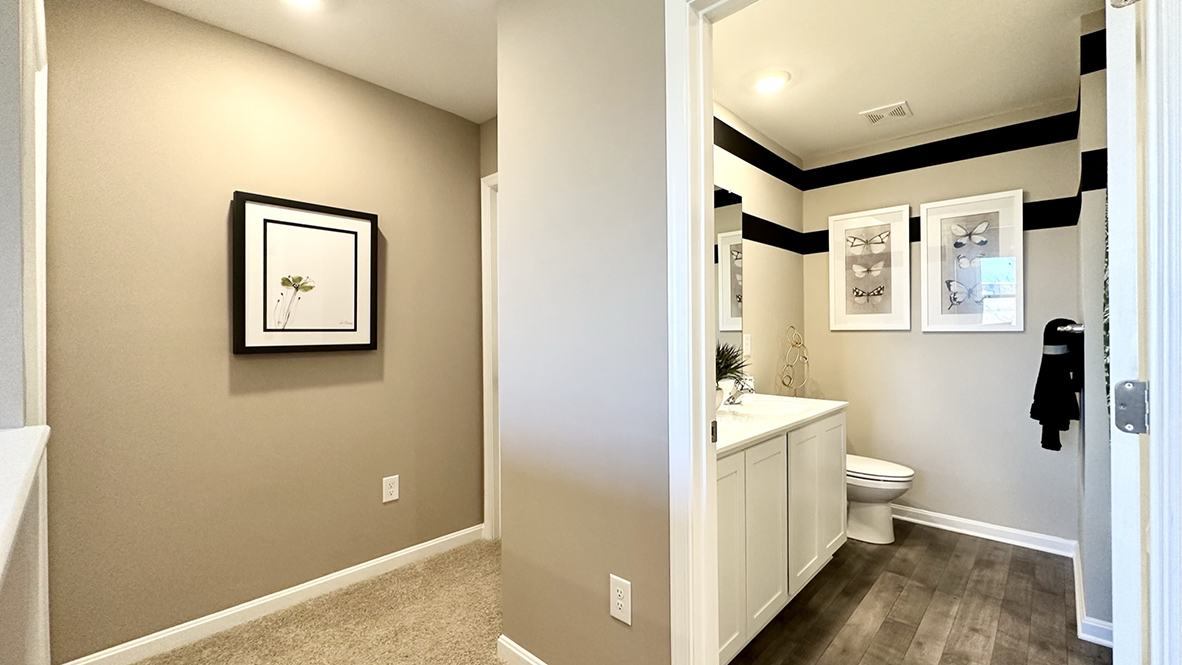 There are three additional bedrooms and a secondary bathroom on the second floor.