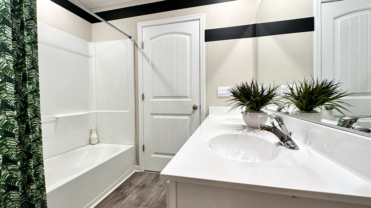 There are three additional bedrooms and a secondary bathroom on the second floor.