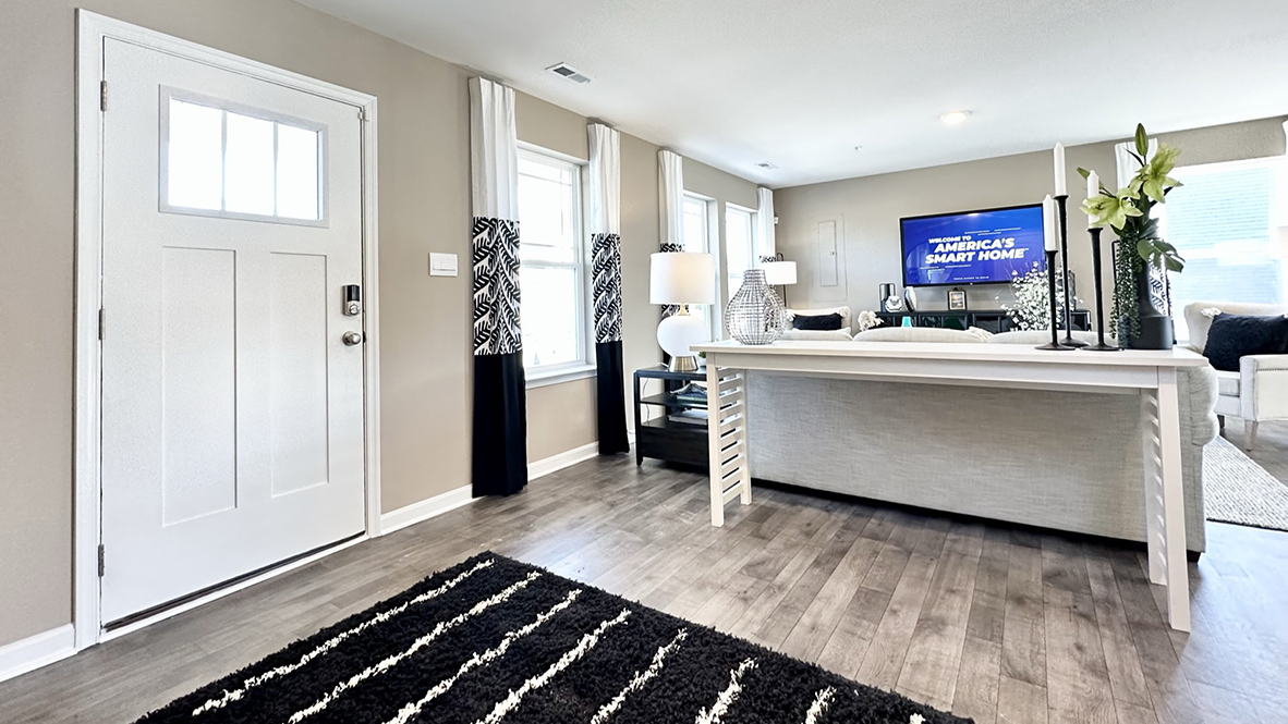 A welcoming foyer greets you as you enter your home from the cozy front porch.