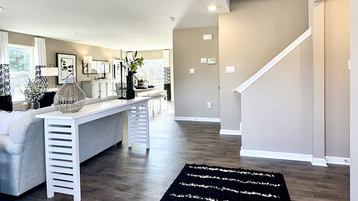 A welcoming foyer greets you as you enter your home from the cozy front porch.