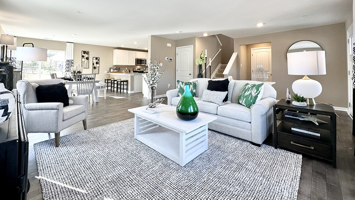 The family room is open to the dining space and the family-friendly kitchen.