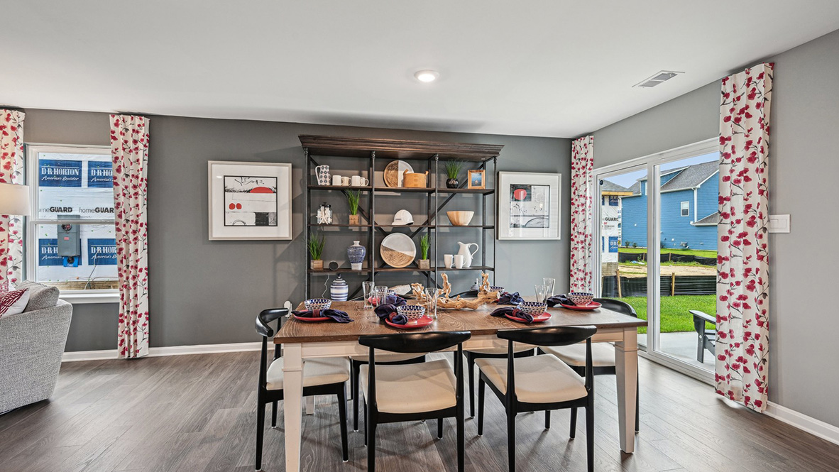 The family room is open to the dining space and the family-friendly kitchen.