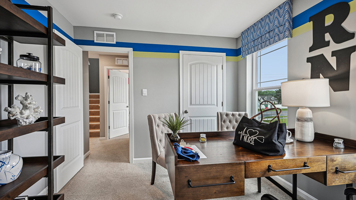 There are three additional bedrooms and a secondary bathroom on the second floor.