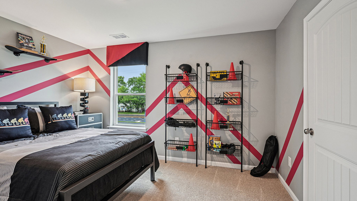 There are three additional bedrooms and a secondary bathroom on the second floor.