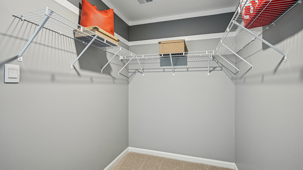 The upstairs owner's bedroom has a walk-in closet.