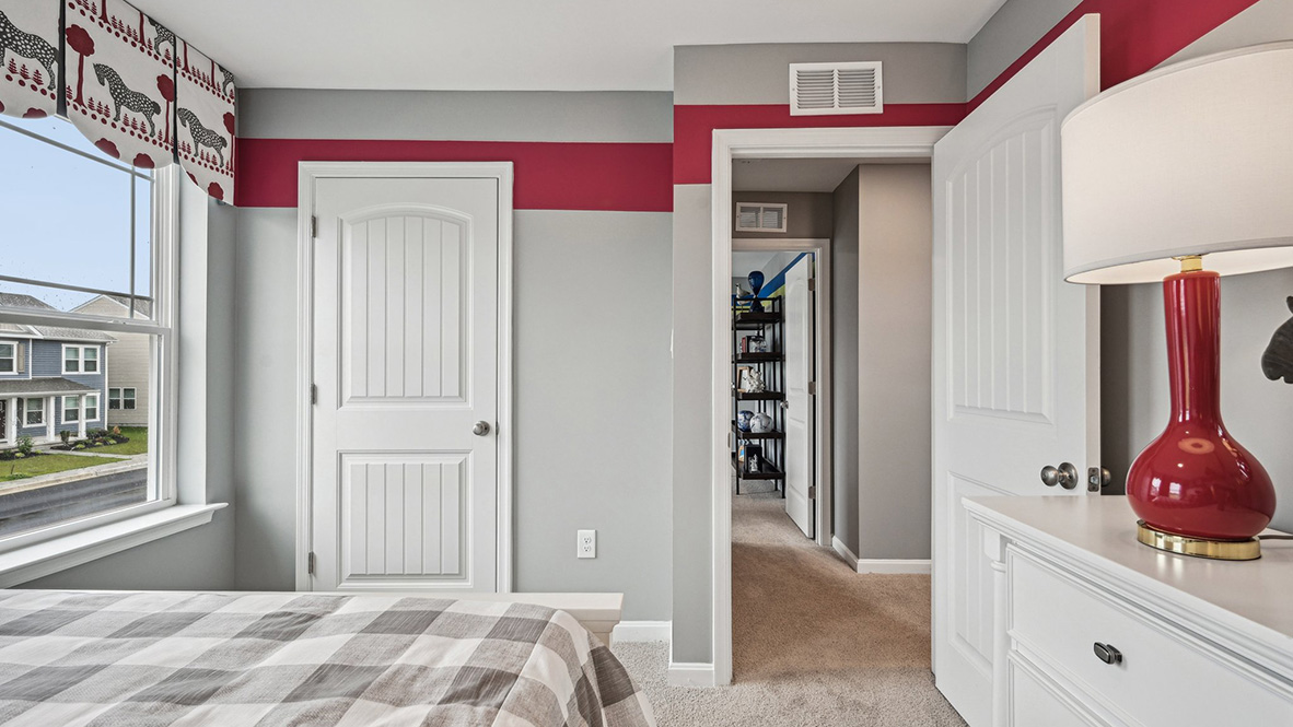 There are three additional bedrooms and a secondary bathroom on the second floor.