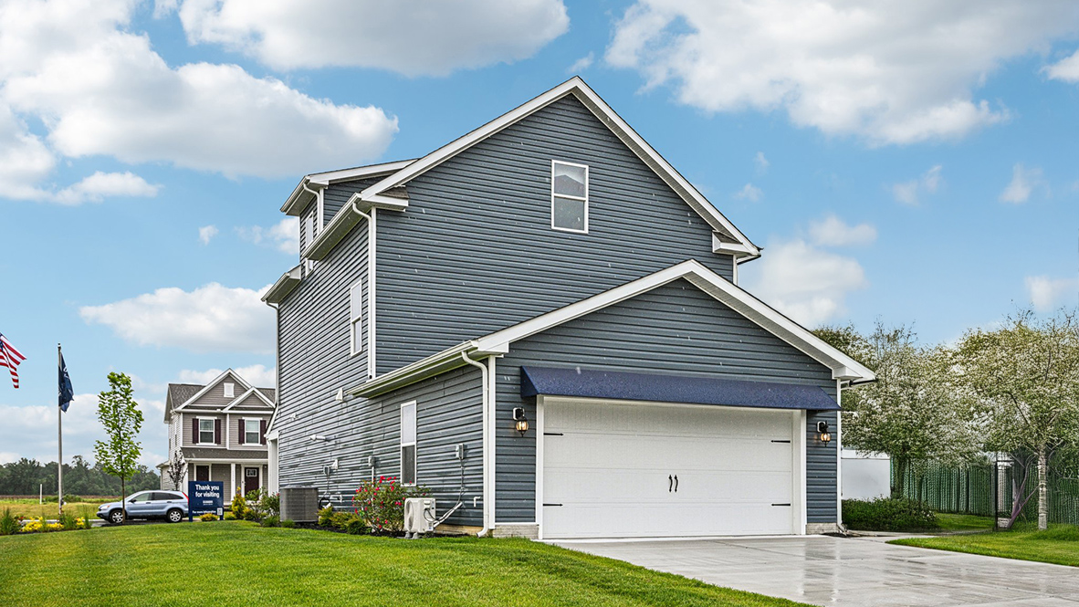 The two-car garage with a private entrance is behind the home.