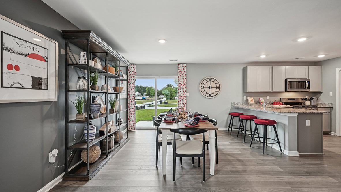 The family room is open to the dining space and the family-friendly kitchen.
