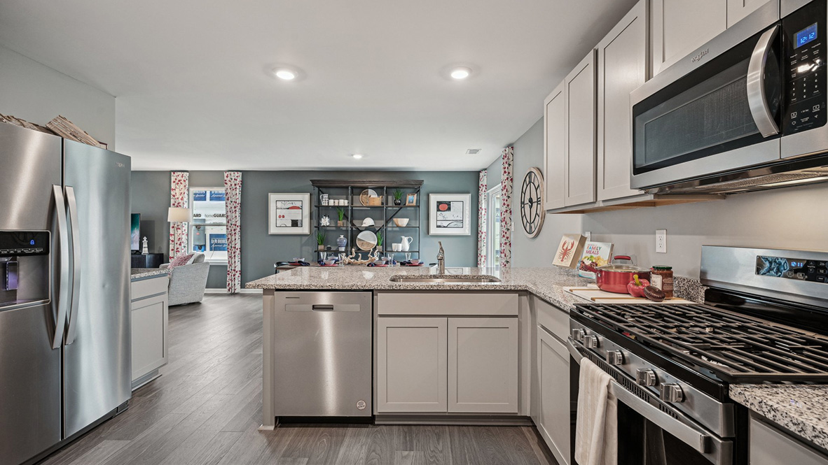 The family-friendly kitchen has stainless steel appliances.