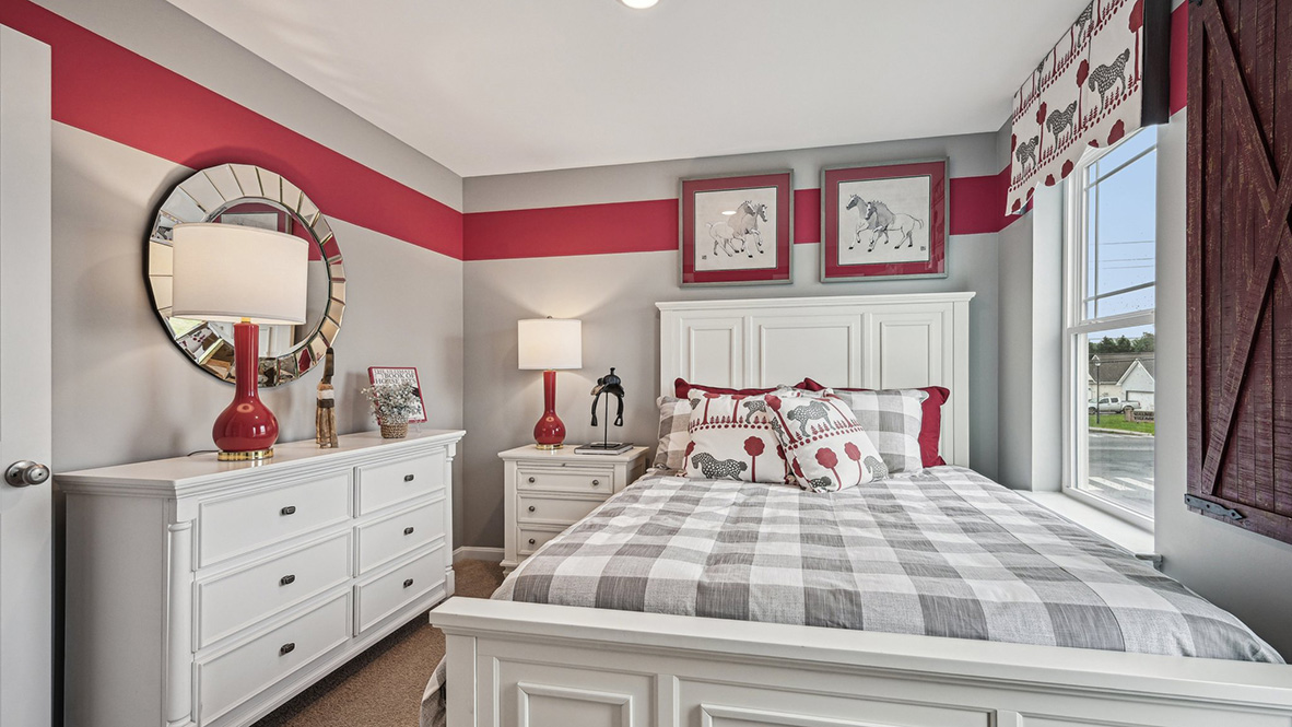 There are three additional bedrooms and a secondary bathroom on the second floor.