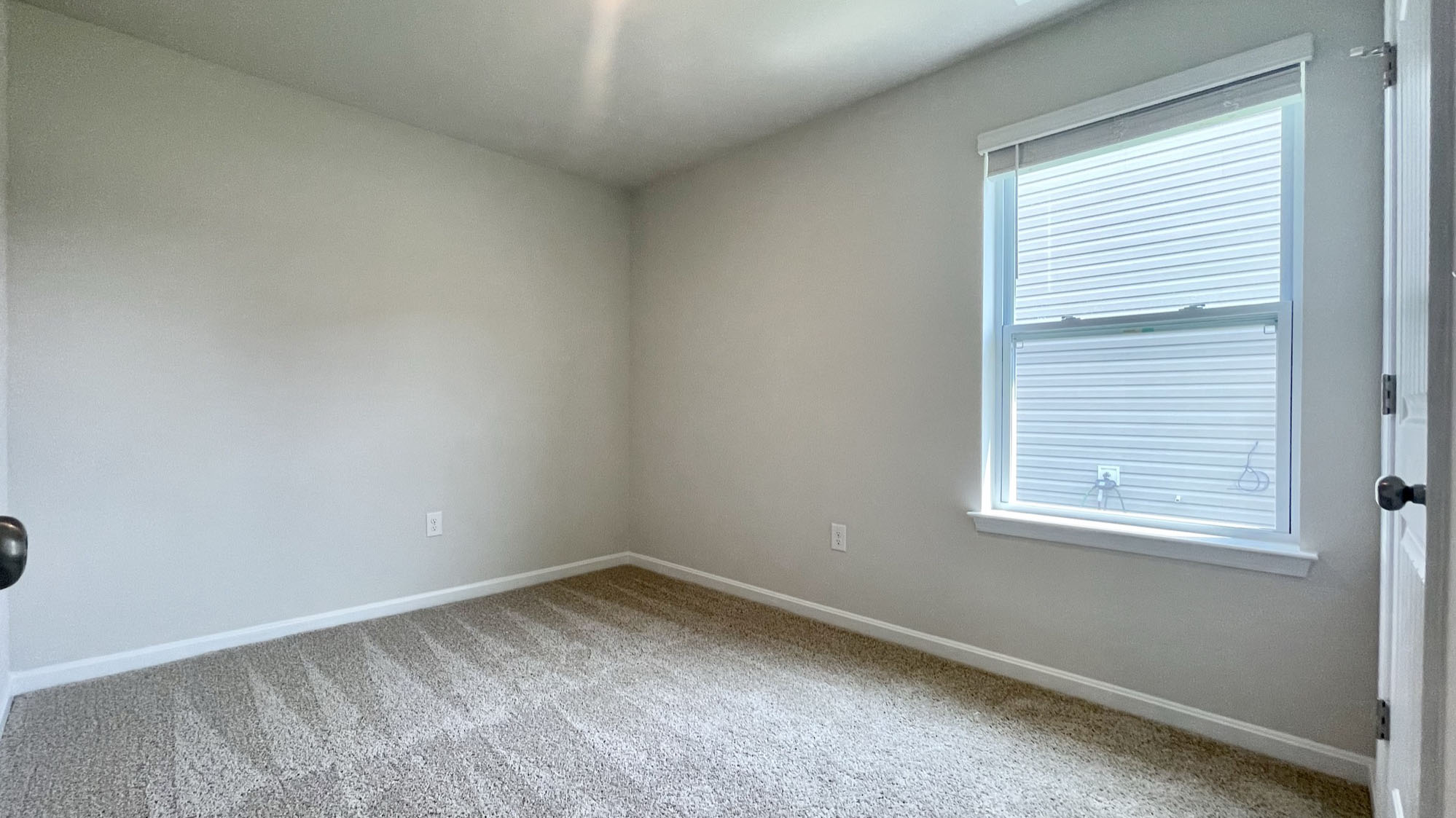 There are three sizeable secondary bedrooms located down the front hallway.