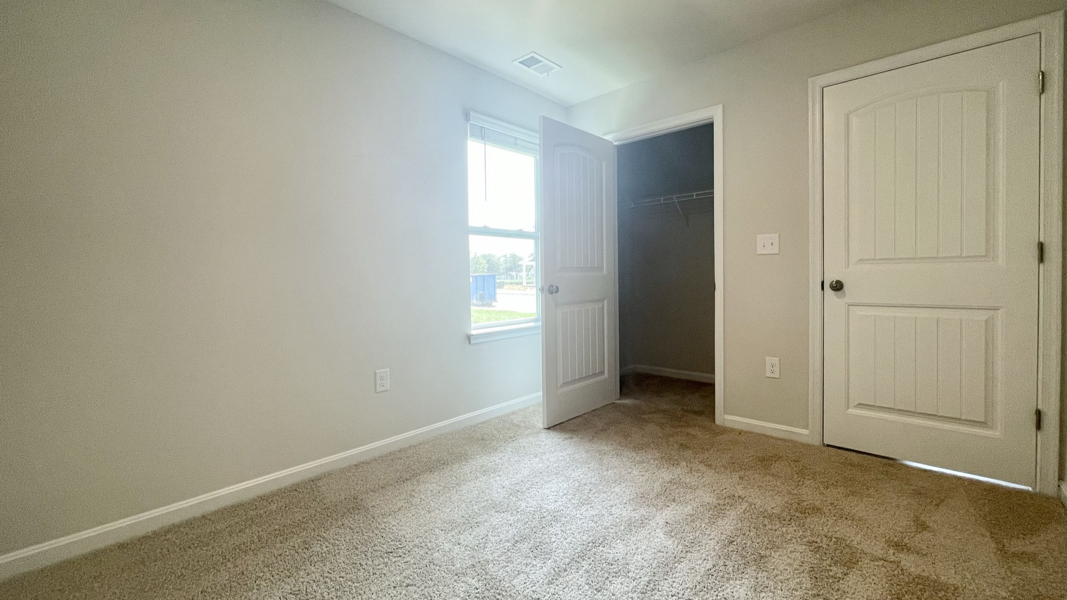 There are three sizeable secondary bedrooms located down the front hallway.