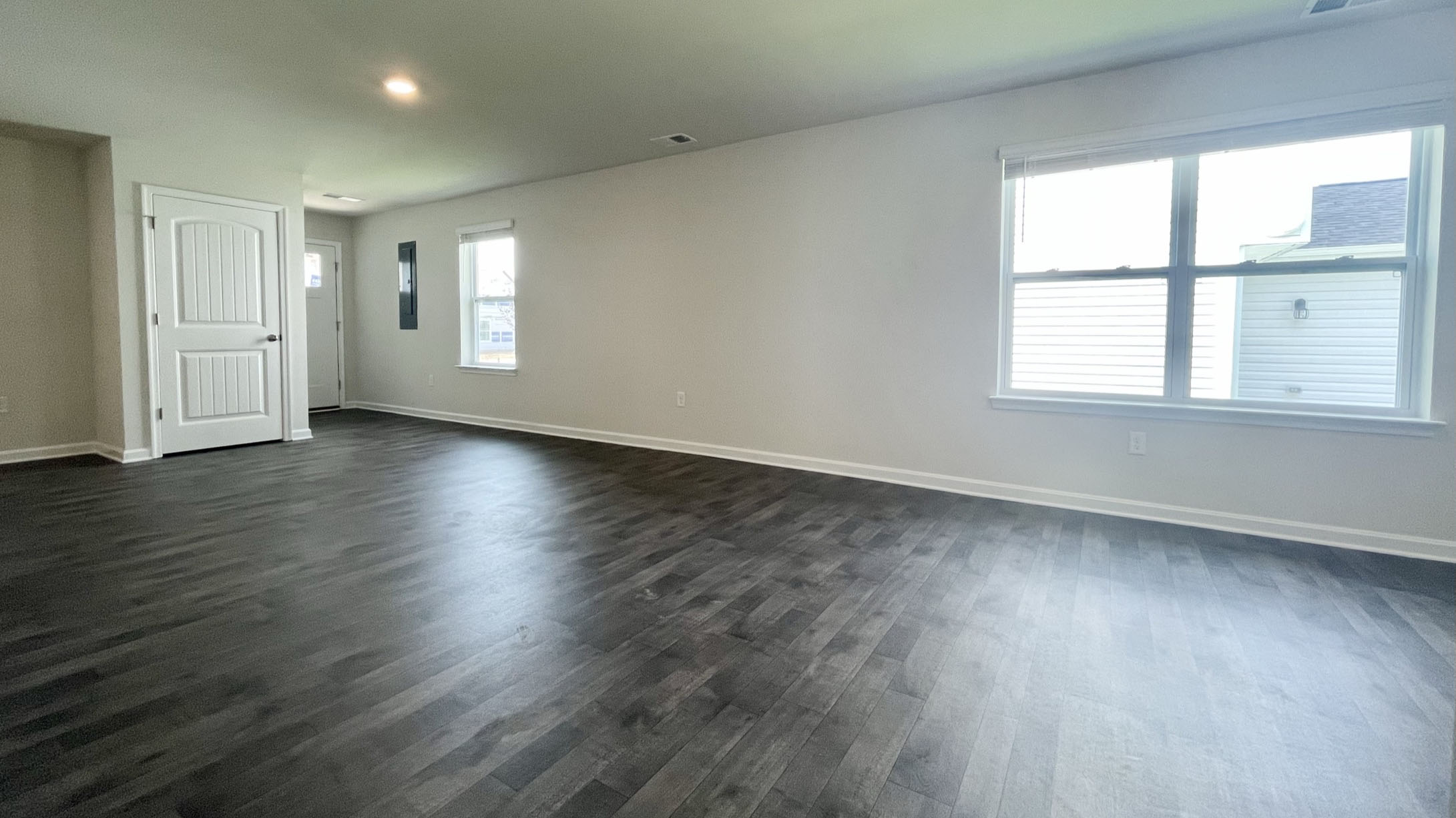 The open concept, large great room leads into the dining area and spacious kitchen.