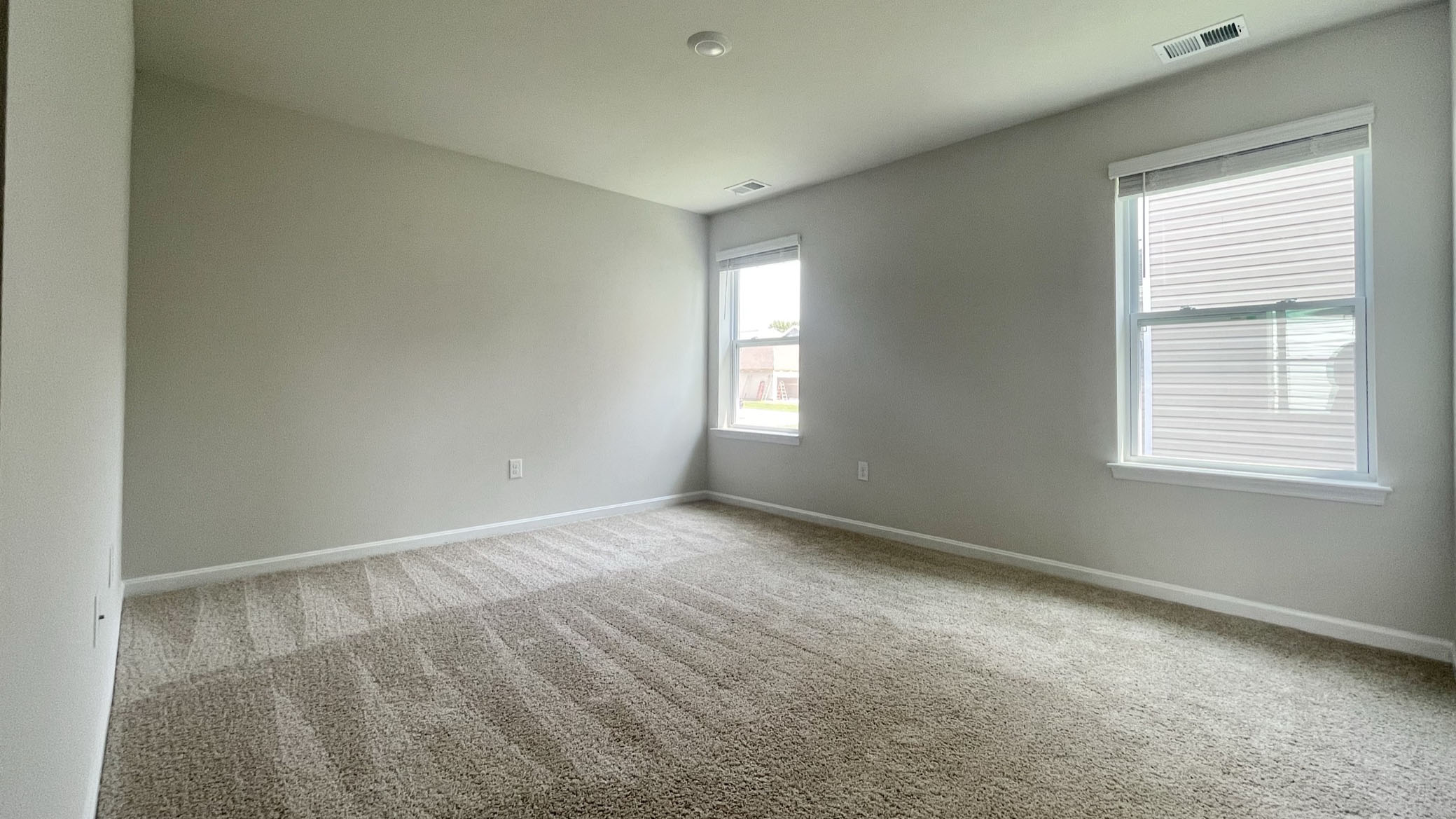 The roomy owner’s bedroom is complete with a full bathroom and walk-in closet.