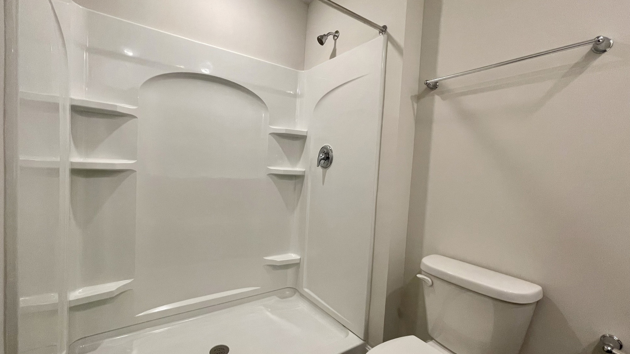 The roomy owner’s bedroom is complete with a full bathroom and walk-in closet.