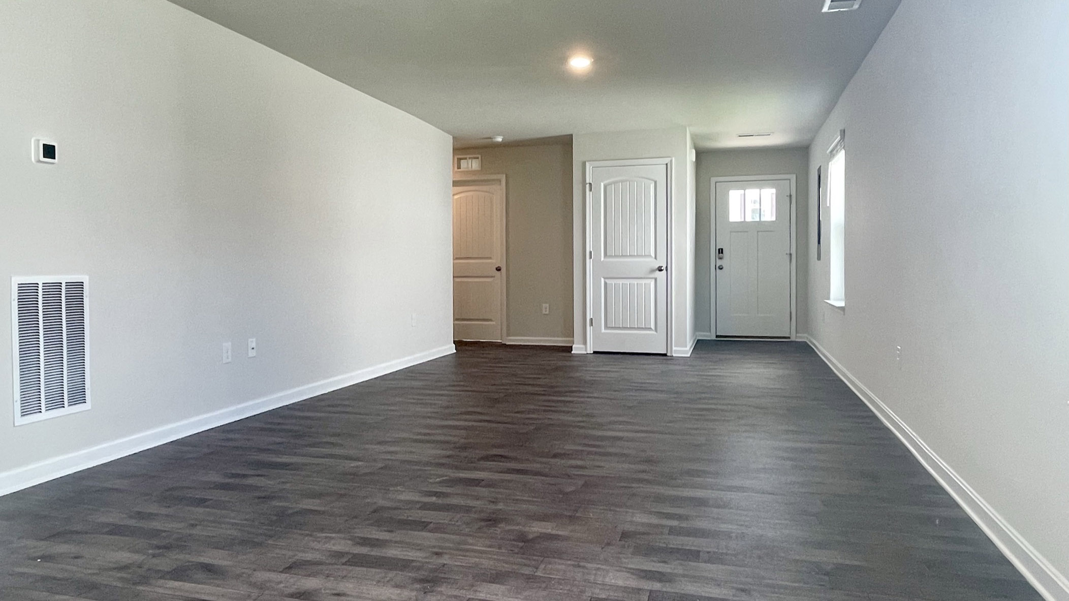The open concept, large great room leads into the dining area and spacious kitchen.