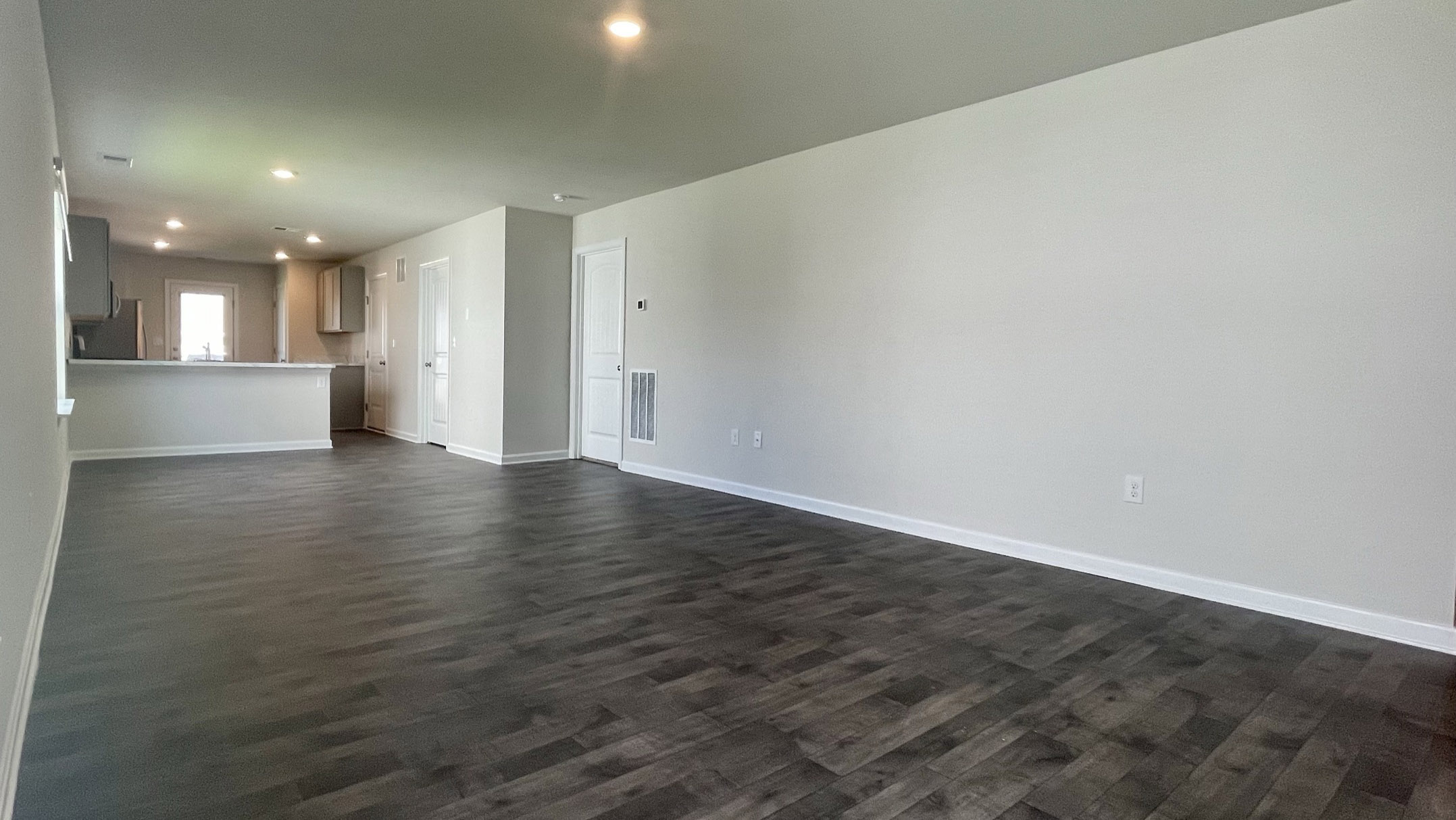 As you enter the home through the foyer, there is an open-concept, large great room.