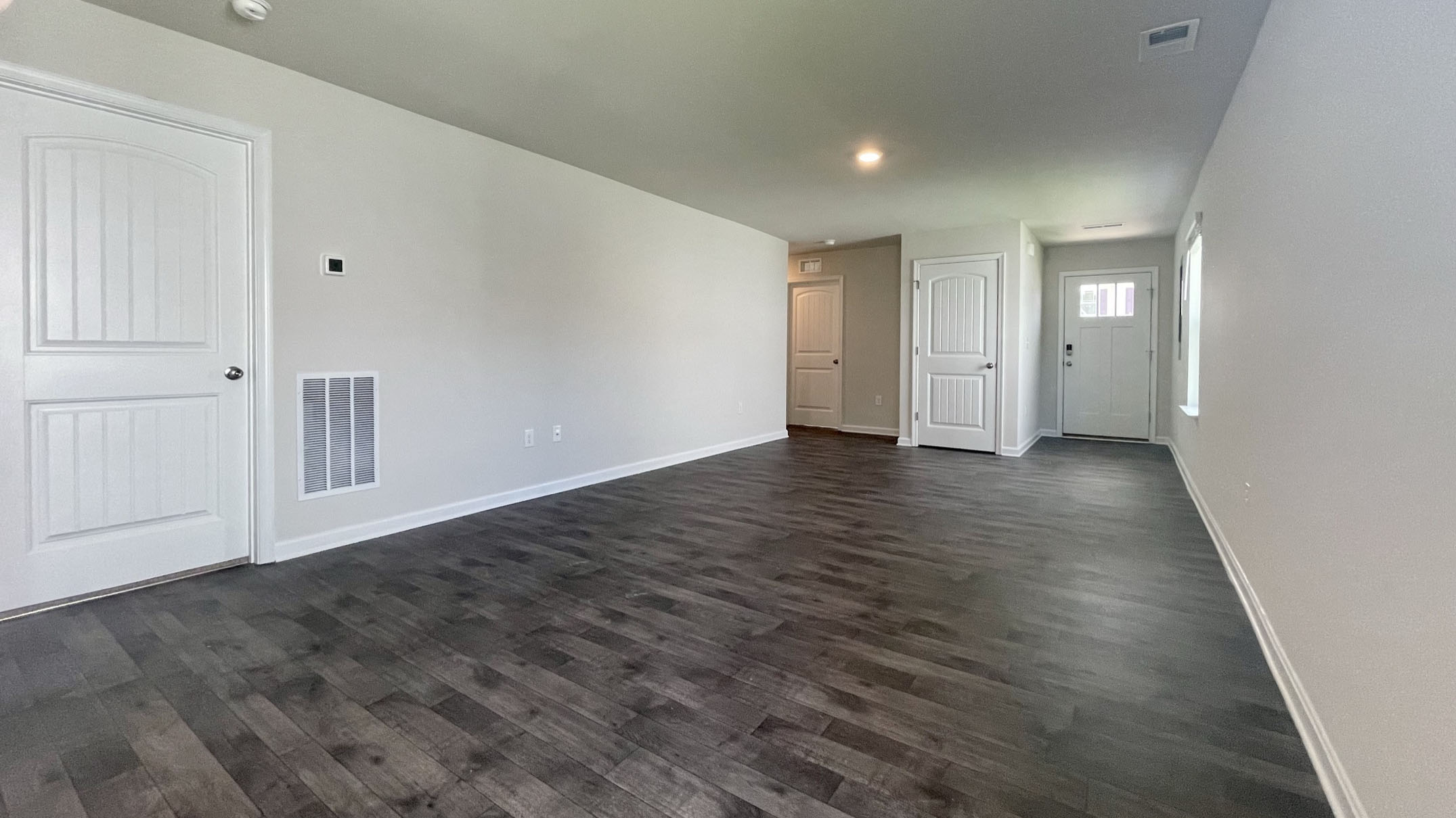 The open concept, large great room leads into the dining area and spacious kitchen.