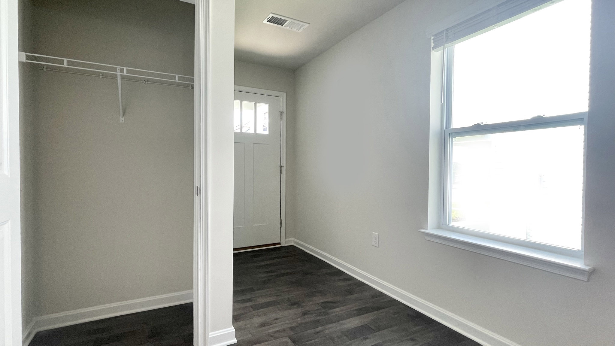As you enter the home through the foyer, a spacious coat closet is on the right side of the room.