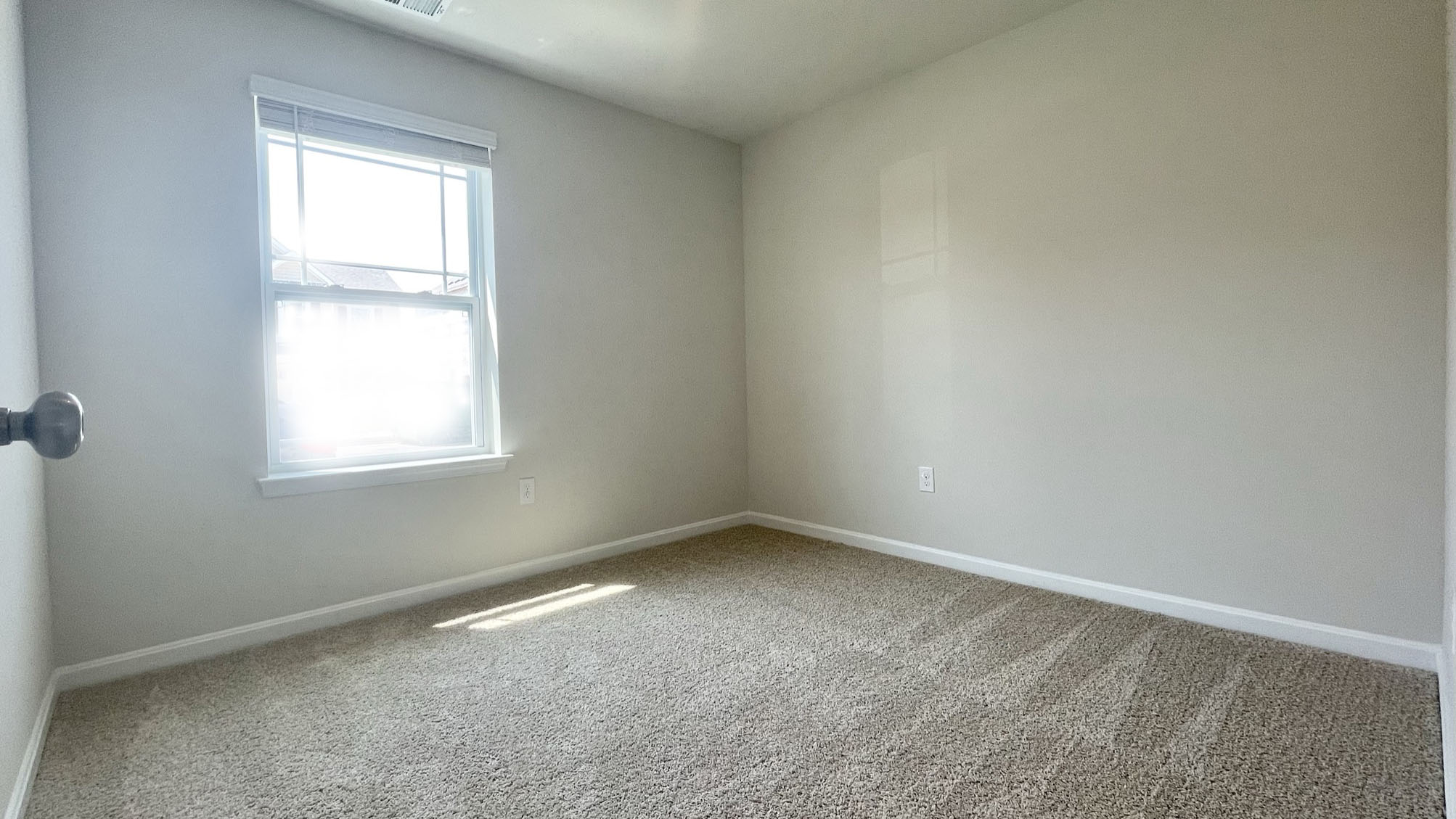 There are three sizeable secondary bedrooms located down the front hallway.