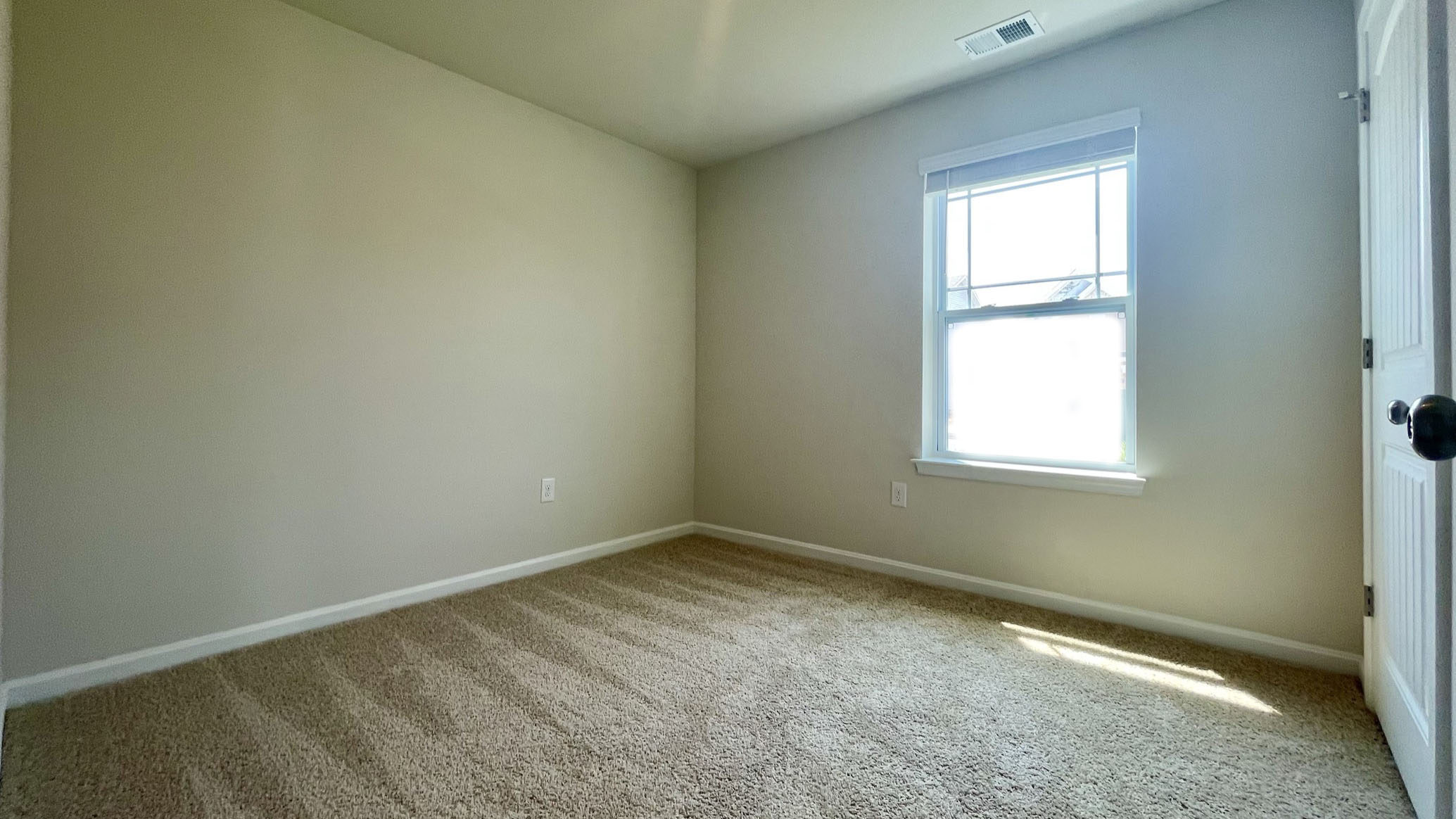 There are three sizeable secondary bedrooms located down the front hallway.