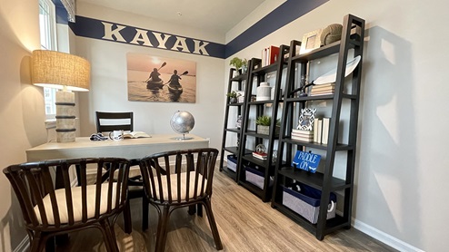 The office with French doors that provides the perfect space for a home office or a private den.