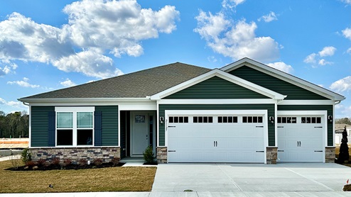 A Wheaton one-story home with a three-car garage.