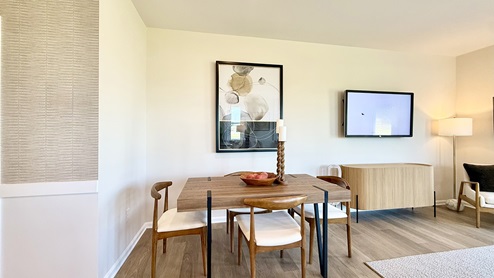 The kitchen is open to the ample dining area.