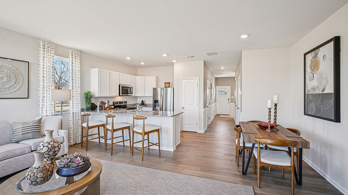 The home's functional eat-in kitchen features a spacious peninsula island with room for seating.