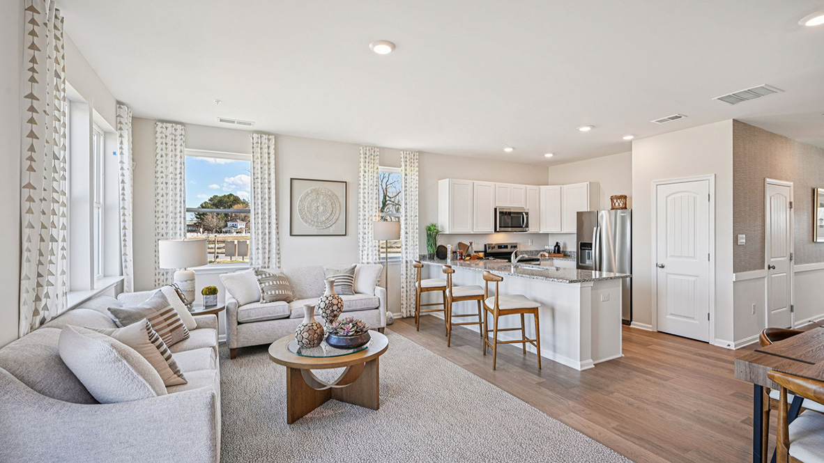 The kitchen is open to the ample living room and dining area.