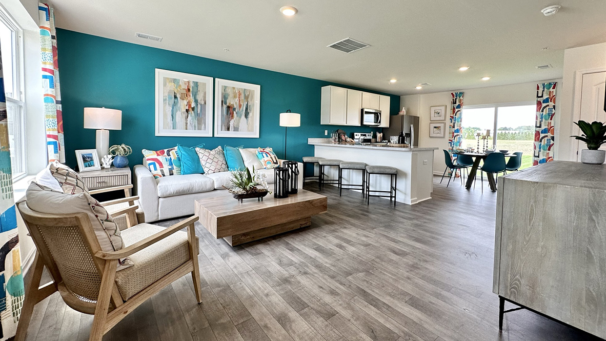 The open-concept floorplan allows the family room to flow easily into the eat-in kitchen.