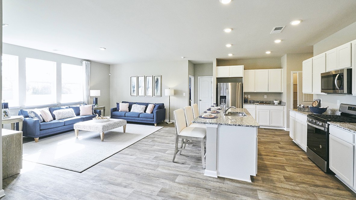 The home's well-designed kitchen features an oversized island.