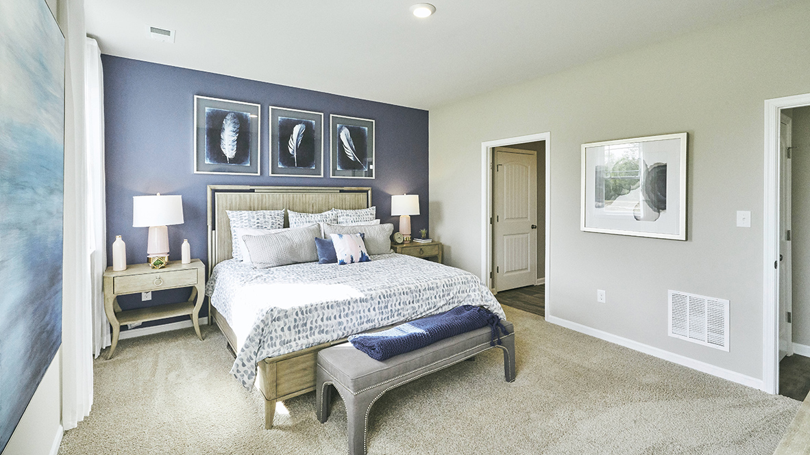 The large owner’s suite has a private bathroom.