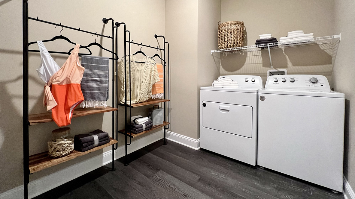 On the other side of the hallway is convenient laundry room.