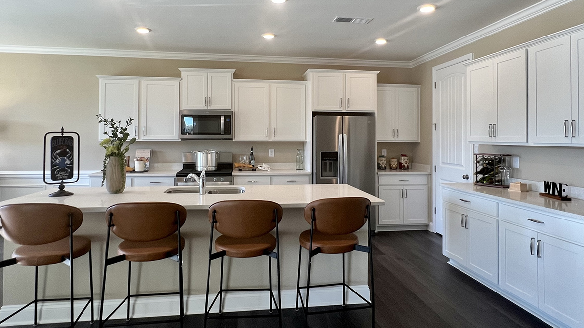 The kitchen comes complete with stainless steel appliances.