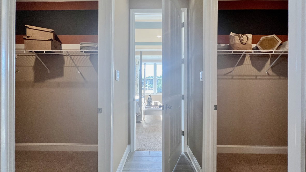 The bedroom has two walk-in closets.