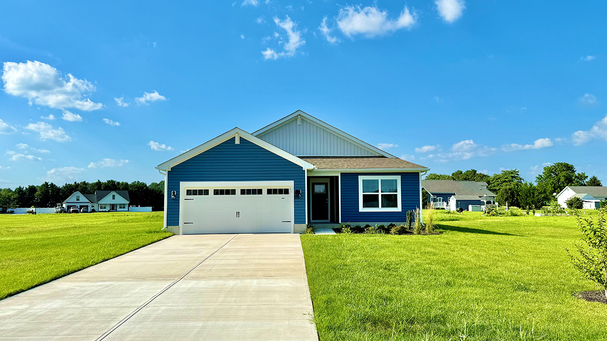 A one-story Lismore home with blue siding.