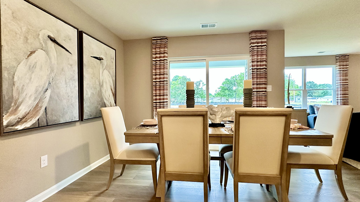 The dining area looks out to the back yard.