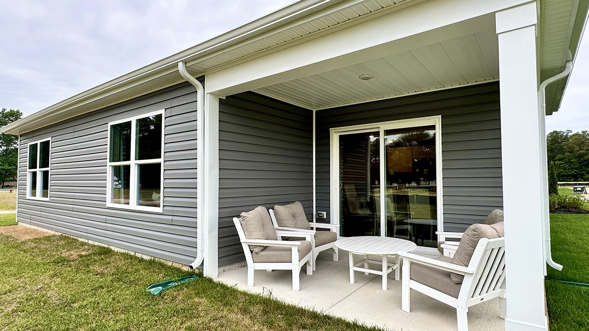 A covered patio is off the dining area.