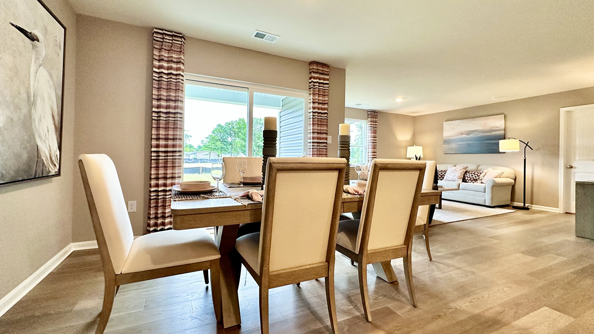The dining area continues into the living area.