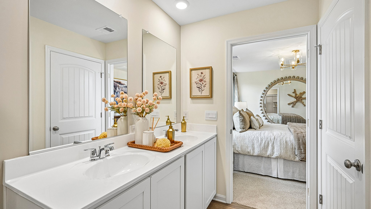 The spacious bedroom, ample walk-in closet and oversized owner’s bath with its luxurious shower are all a must-see.