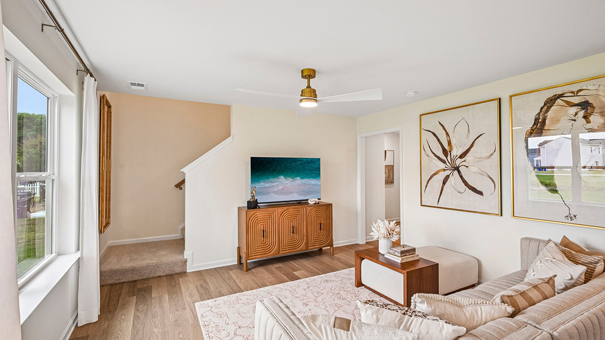 The open concept living room flows nicely into the eat-in kitchen.