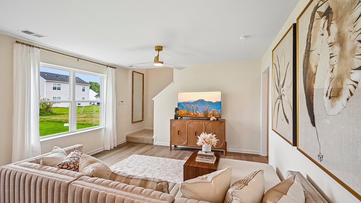 The open concept living room flows nicely into the eat-in kitchen.