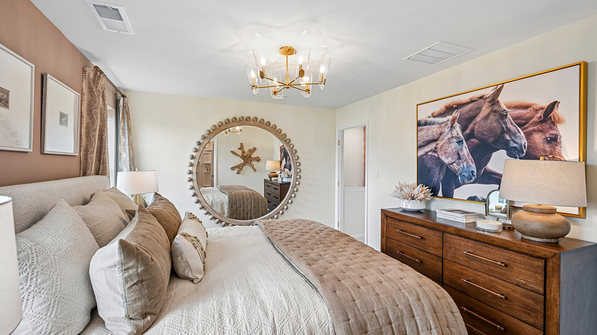 The spacious bedroom, ample walk-in closet and oversized owner’s bath with its luxurious shower are all a must-see.