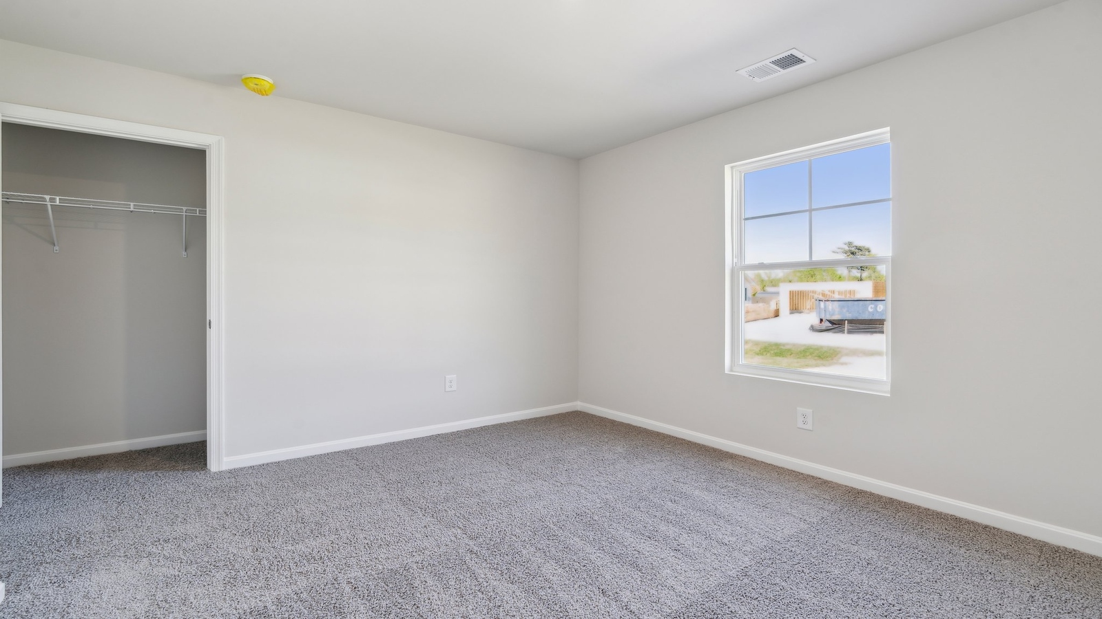 The second generously sized bedroom is in the front of the home.