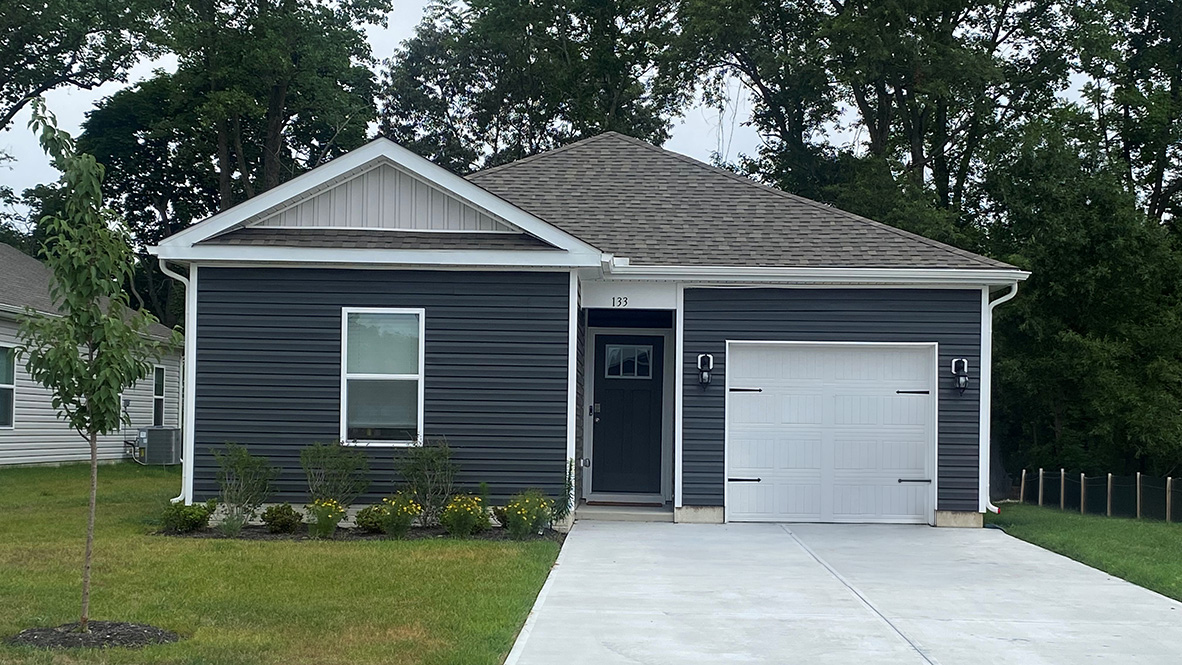 A cottage-style ranch home located at 1293 Orchid Loop in Salisbury, MD.